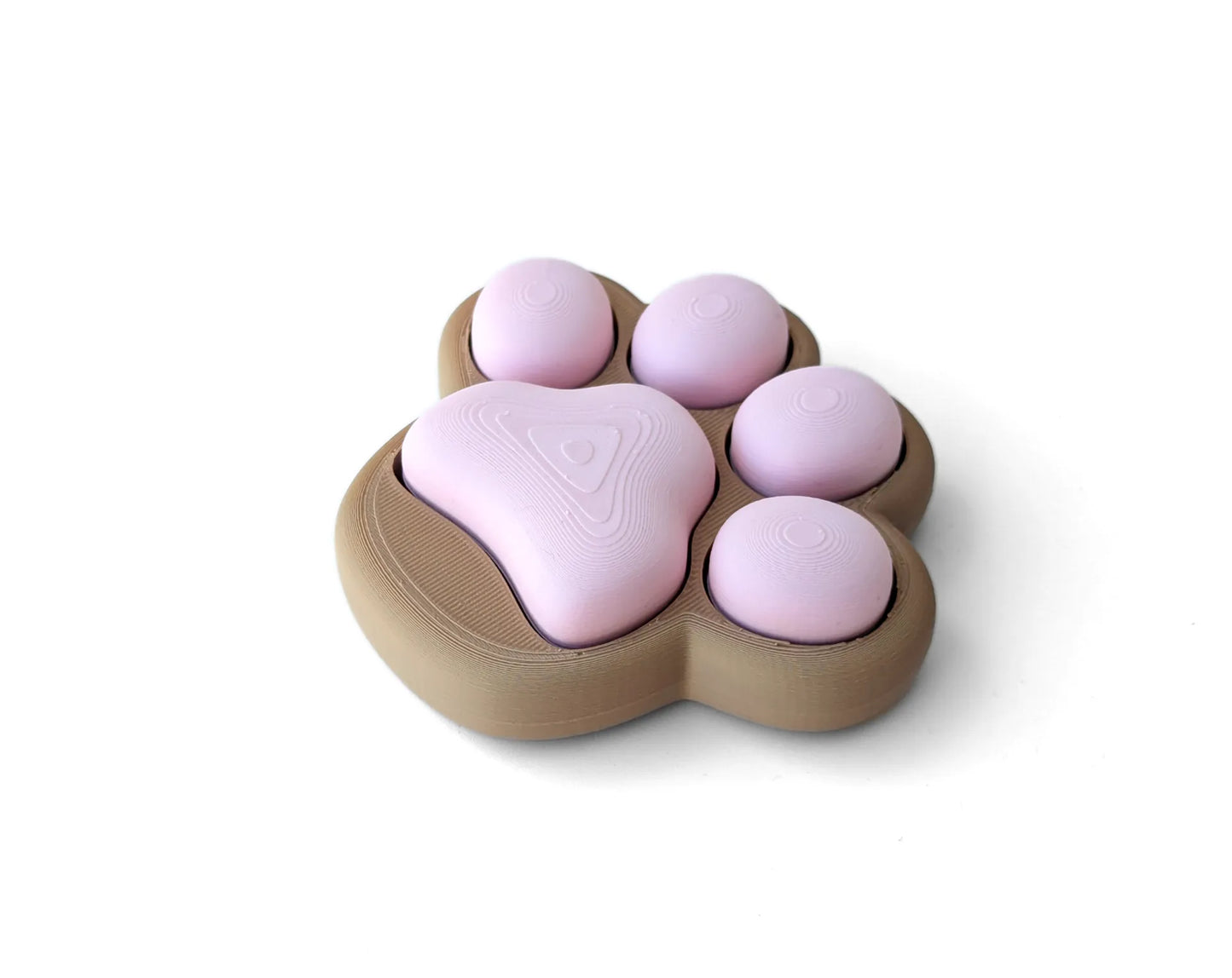 Patita Clicker Antiestrés impresa en 3D con diseño de huella de mascota para aliviar el estrés y mantener las manos ocupadas.