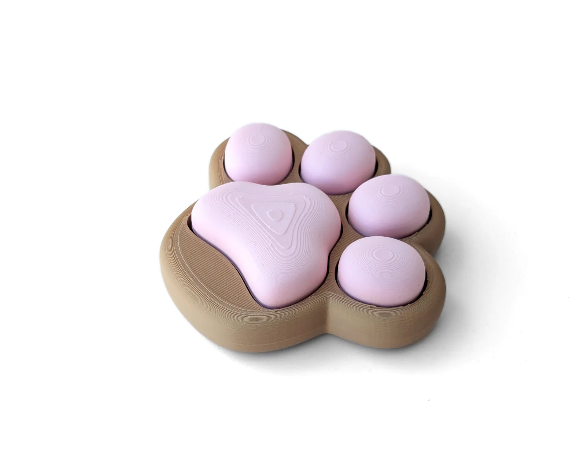 Patita Clicker Antiestrés impresa en 3D con diseño de huella de mascota para aliviar el estrés y mantener las manos ocupadas.
