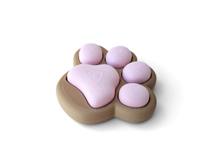 Patita Clicker Antiestrés impresa en 3D con diseño de huella de mascota para aliviar el estrés y mantener las manos ocupadas.