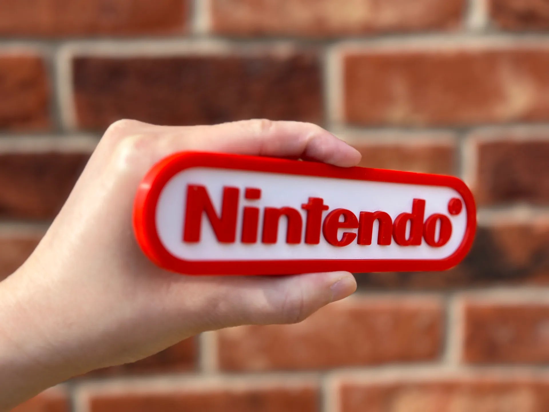 Logo 3D de Nintendo con acabado mate y gran nivel de detalle para decoración de escritorios, vitrinas y espacios gaming.