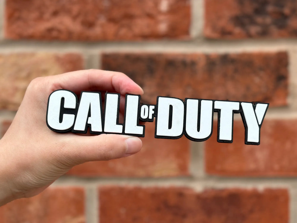 Logo 3D de Call of Duty con acabado mate y gran nivel de detalle para decoración de vitrinas, escritorios y zonas gaming.