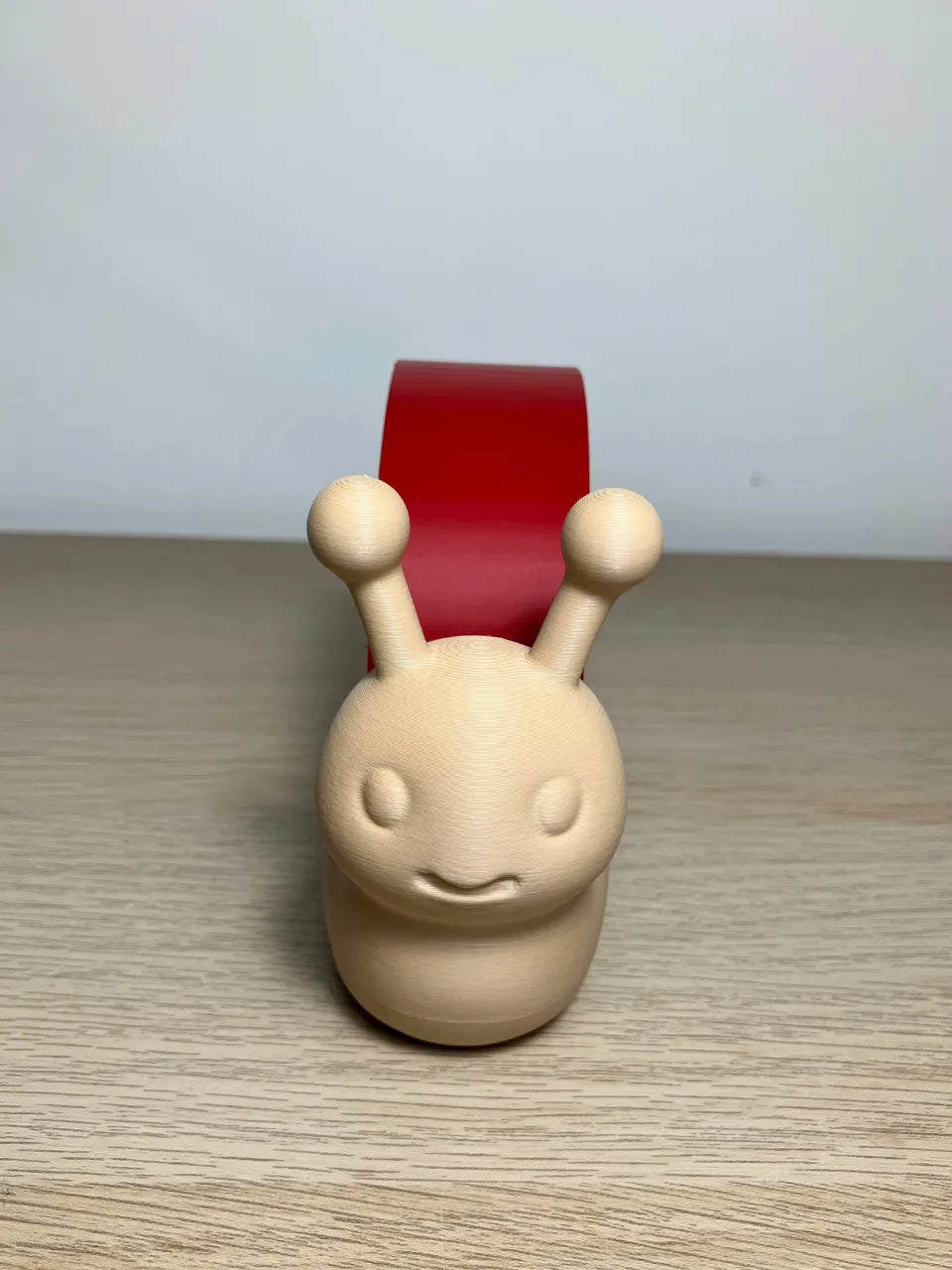 Caracol Apilable Arcoíris, juguete educativo para desarrollar la motricidad fina, la coordinación y la creatividad infantil.