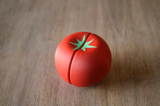 Tomate Magnético Cortable impreso en 3D con piezas magnéticas para cocinitas infantiles y juegos de cocina.