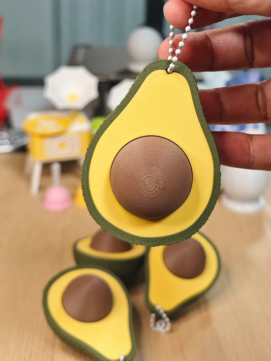 Clicker de Aguacate impreso en 3D con diseño antiestrés para escritorio, setup gaming, colección y uso diario.