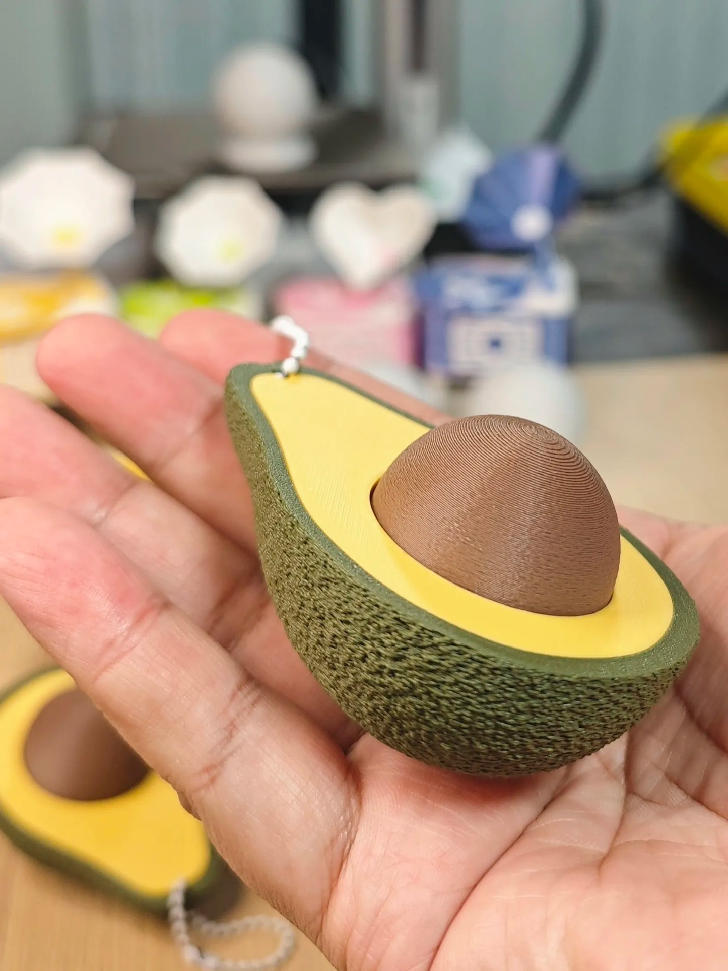 Clicker de Aguacate impreso en 3D con diseño antiestrés para escritorio, setup gaming, colección y uso diario.