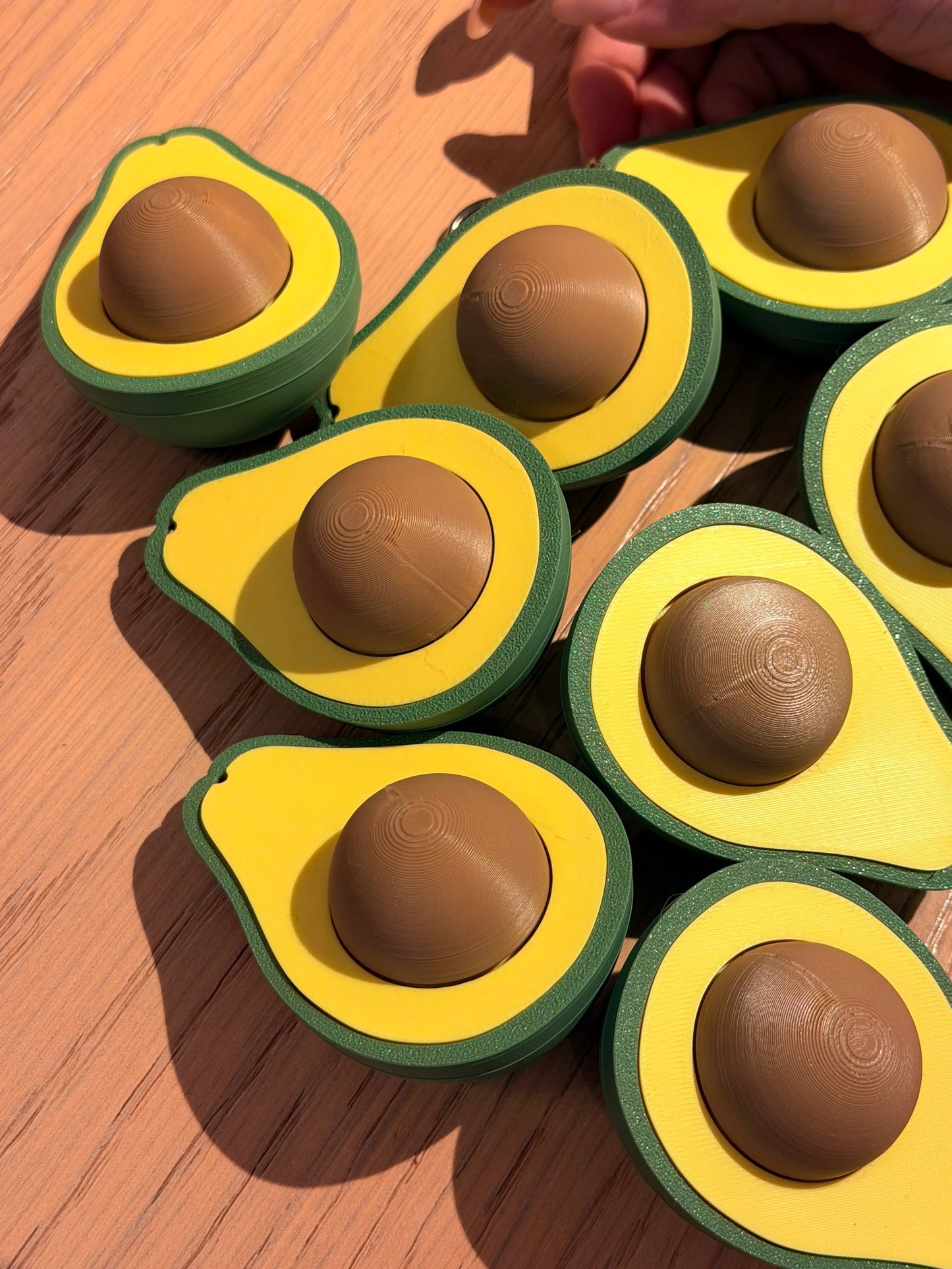 Clicker de Aguacate impreso en 3D con diseño antiestrés para escritorio, setup gaming, colección y uso diario.