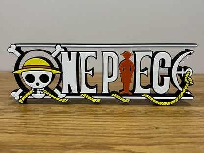 Logo 3D de One Piece con acabado mate y gran nivel de detalle para decoración de escritorios, vitrinas y espacios gaming.