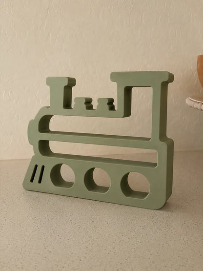 Estantería de Tren Infantil impresa en 3D con diseño de locomotora para decorar habitaciones y organizar juguetes.