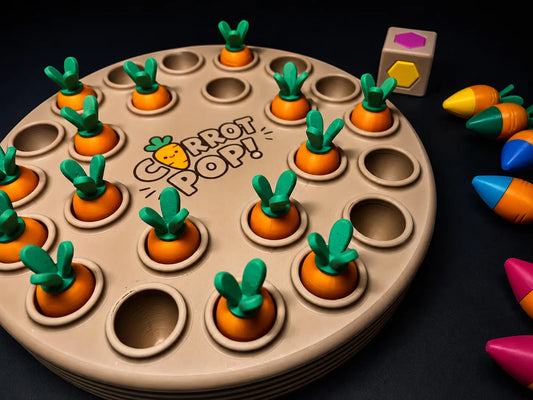 Carrot Pop! juego de memoria impreso en 3D con temática de zanahorias para desarrollar la memoria y la concentración.