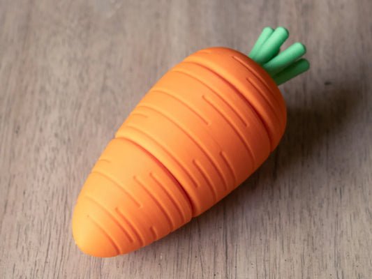 Zanahoria Magnética Cortable impresa en 3D con piezas magnéticas para cocinitas infantiles y juegos de cocina.